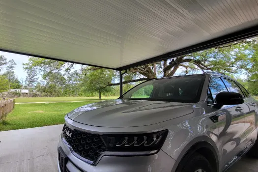 SUV under aluminum carport patio cover